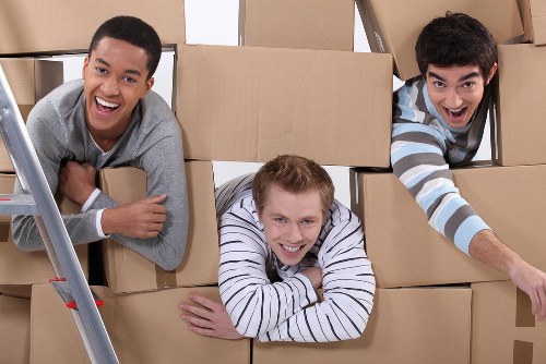 Local movers organizing belongings for a house move in Woodside