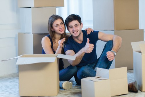 Local office movers handling furniture and equipment